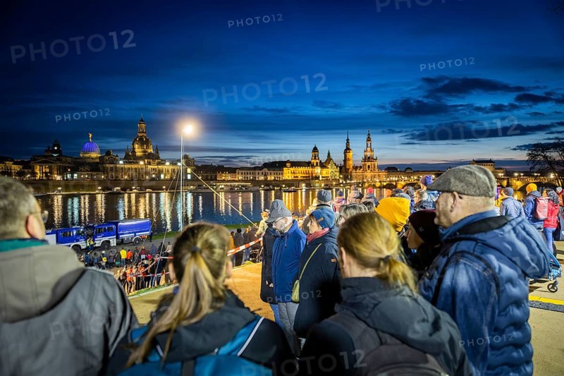 On 13 and 14 February 1945, Dresden was heavily destroyed in three Allied bombing raids. Every year, the people of Dresden commemorate this event at various events. A long human chain symbolised the protection of the city centre. Here looking from the Königsufer across the Elbe to the Old Town, Dresden, Saxony, Germany, Europe