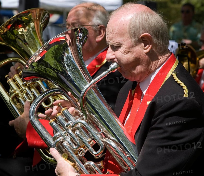 Musicians in a brass band perform during a country fair at Helmingham Hall, Suffolk, England, United Kingdom, Europe