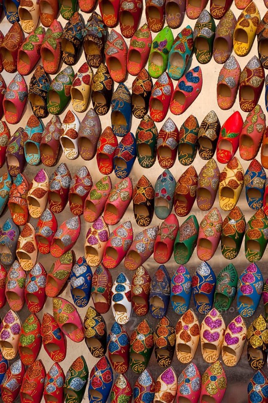 Small babouche magnets on a market, shoes, painted, trade, market, trader, bazaar, offer, colourful, handicraft, Islam, souk, medina, product presentation, display, trade, tourism, Sovenian, travel, African, Arabic, Essaouira, Morocco, Africa