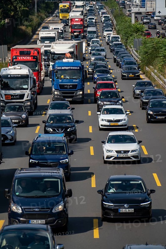 Traffic jam on the A3 motorway, over 8 lanes, in both directions, in front of the Leverkusen motorway junction, Friday afternoon high traffic volume, roadworks, Leverkusen, North Rhine-Westphalia, Germany, Europe