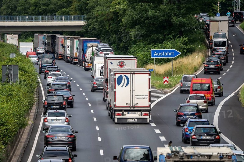 Traffic jam on the A40 motorway, near Mülheim-Winkhausen, in the direction of Duisburg, after an accident, vehicles form a rescue lane, North Rhine-Westphalia, Germany, Europe