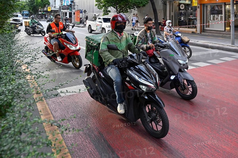 Grab scooter rider
