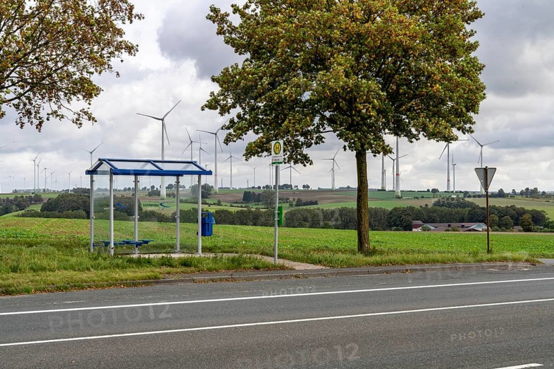 Bus stop in the countryside, on the B68, new, modern bus shelter, line to Warburg, Ostwestfalen Lippe, bus route S 85, Grundsteinheimer Weg stop, north of Lichtenau, Verkehrsverbund fahr mit - Mobil im Hochstift, North Rhine-Westphalia, Germany, Europe