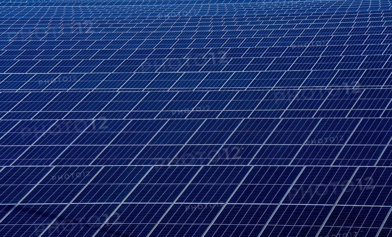 Vopak Solarpark Eemshaven, 19 hectares of solar modules with a capacity of 25 megawatts, around the Vopak tank terminal in the industrial harbour of Eemshaven, wind farm, Groningen, Netherlands