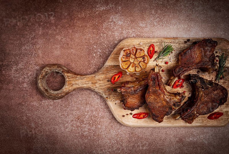 Fried veal ribs, with spices, baked in the oven, homemade, no people