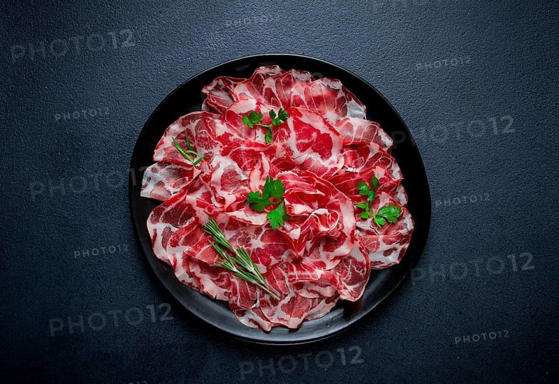 Sliced cured ham, prosciutto, italian dish, delicacy, parma ham, top view, no people