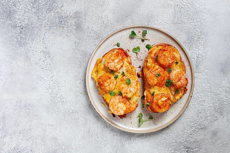 Sandwiches with shrimp and cheese, baked in the oven, with microgreens, breakfast, homemade, no people