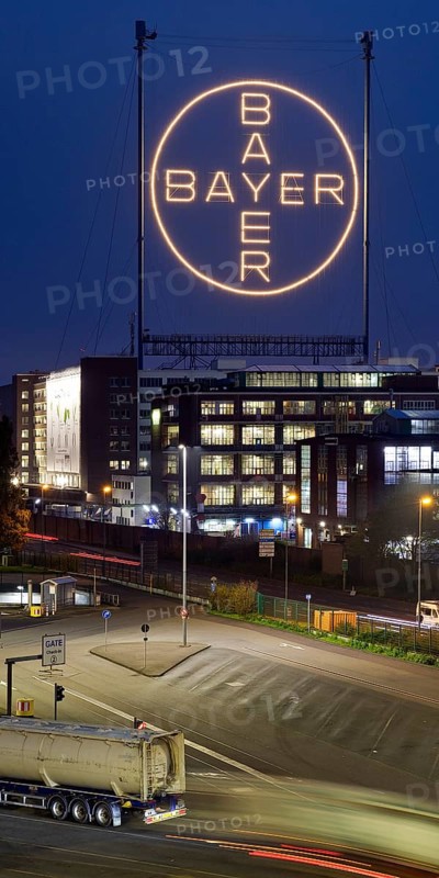 Bayer cross in the blue hour on the premises of Bayer AG, Leverkusen, Bergisches Land, North Rhine-Westphalia, Germany, Europe