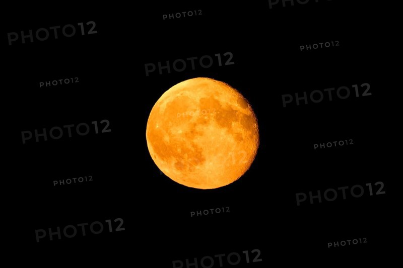 Bright orange full moon against a black night sky, super moon, Stuttgart, Baden-Württemberg, Germany, Europe