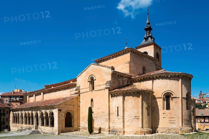 Historic church with stone arches and a Gothic tower under a blue sky, Church of San Millan, Segovia, Castilla y León, Leon, Spain, Europe