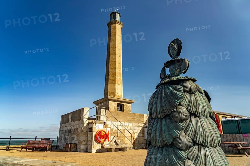 Bronze sculpture Mrs Booth The Shell Lady and the Margate Lighthouse, Kent, England, Great Britain