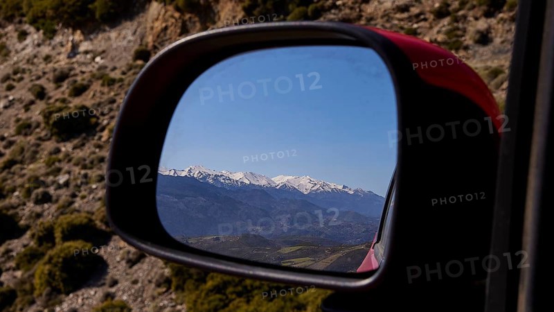Mountain landscape in winter, reflected in the car mirror during a car journey, Lefka Ori, White Mountains, mountain massif, west, Crete, Greece, Europe