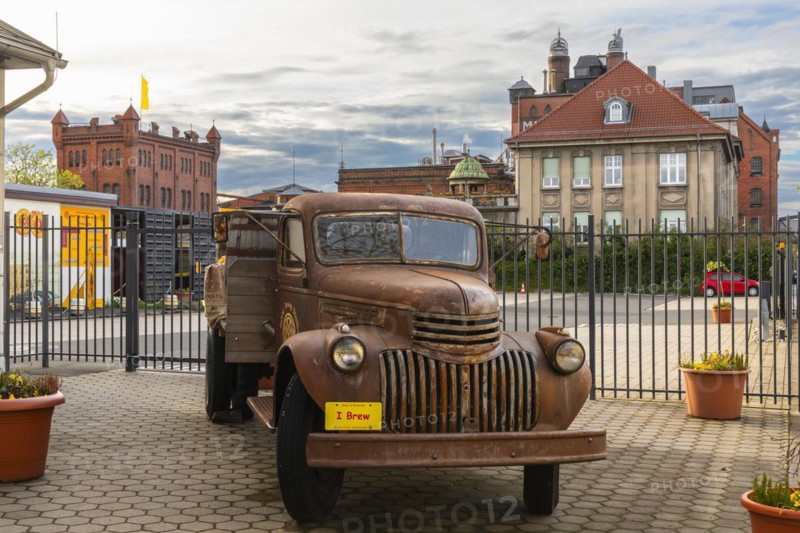 Historic car in front of the Weyermann malthouse, Bamberg, Lower Franconia, Bavaria, Germany, Europe