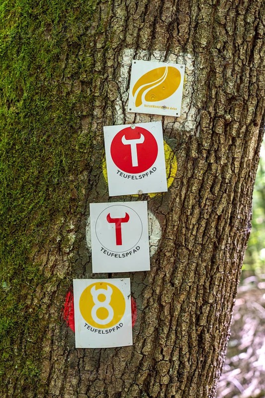 Hiking signs for various hiking trails in the Devil's Gorge, near Irrel, Southern Eifel nature park Park, Rhineland-Palatinate, Germany, Europe