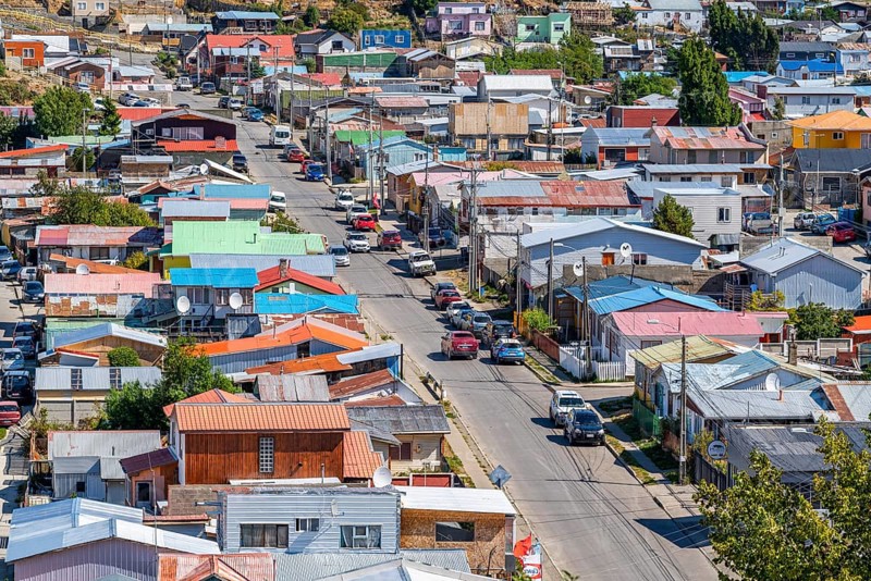 View over a street and colourful houses made of wood and corrugated iron, city of Punta Arenas, Patagonia, Chile, South America