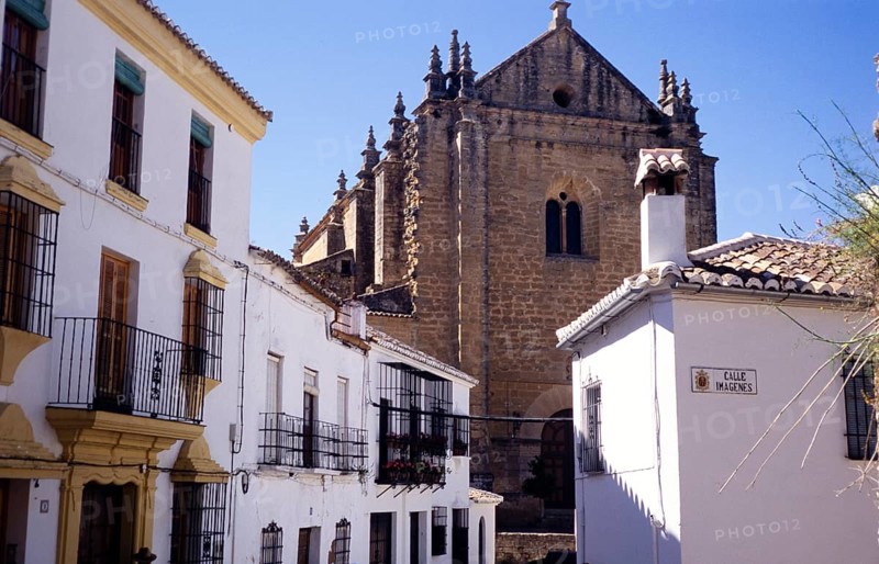 Cathedral church set among historic whitewashed houses in the old town of Ronda, Andalucia, Spain, Europe