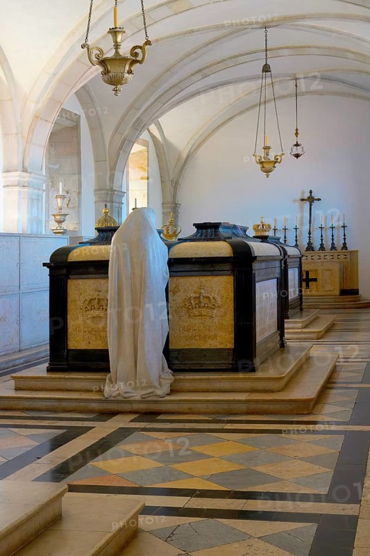 Monastery of Sao Vicente de Fora, Royal Pantheon of the Braganca family, Sculpture of a woman praying in front of the tomb of Carlos I, Lisbon, Portugal, Europe