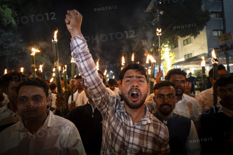 Members of the All Assam Students' Union (AASU) take part in a flaming torch rally and shout slogans to protest against the implementation of the Citizenship Amendment Act (CAA), on March 12, 2024 in Guwahati, Assam, India. The Citizenship Amendment Act (CAA), passed by the Indian Parliament in 2019, indeed grants expedited citizenship to specific religious minorities from Afghanistan, Bangladesh, and Pakistan who arrived in India on or before December 31, 2014. These religious minorities include Hindus, Sikhs, Buddhists, Jains, Parsis, and Christians, Asia