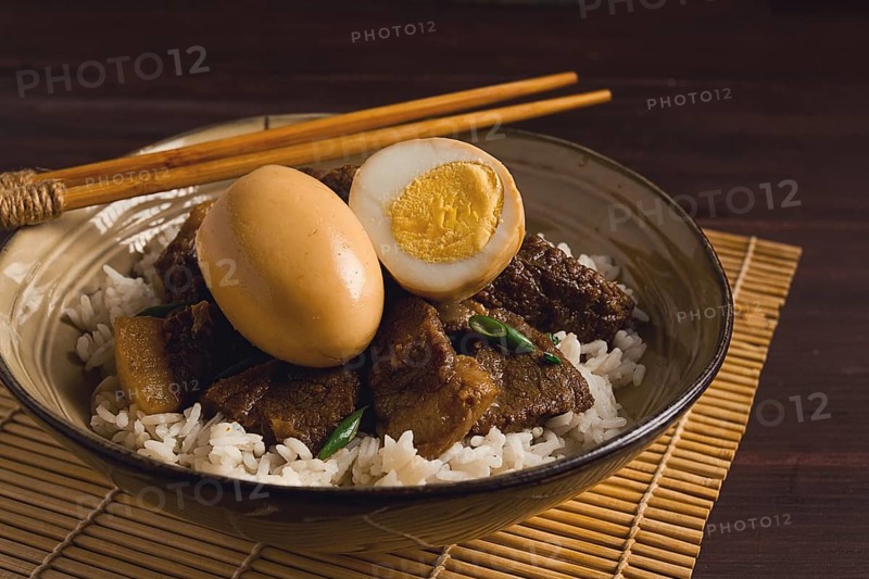 Stewed eggs, with pork belly, and rice, chinese food, homemade, selective focus, rustic, no people