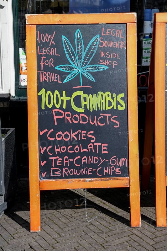 Advertising board on a cannabis shop in the pedestrian zone of The Hague, Holland, Netherlands
