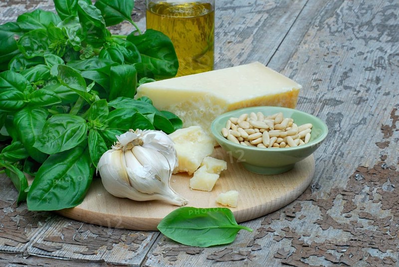 Ingredients for basil pesto, basil, parmesan, olive oil, pine nuts, garlic, parmesan cheese, basil pesto