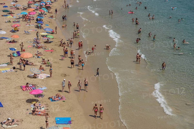 Tourists at Playa de Levante, Benidorm, Alicante, Costa Blanca, Spain, Europe