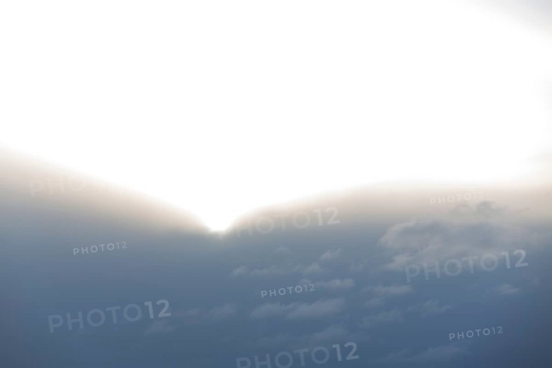Sun comes out of thick cloud wall, Germany, Europe