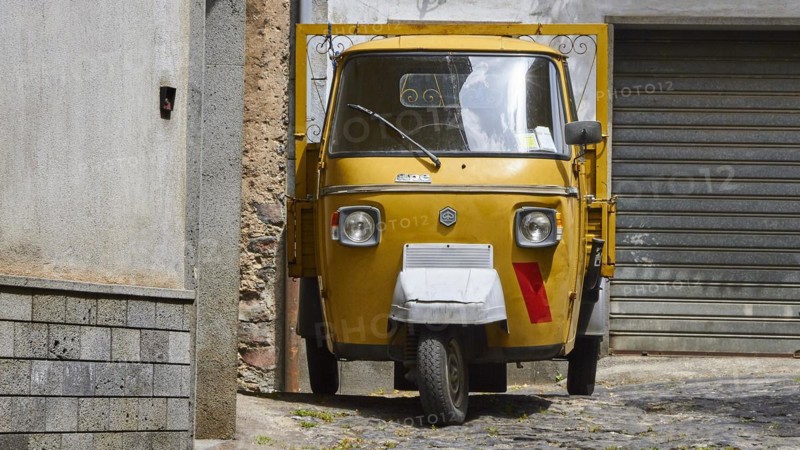 Bronze Ape, tricycle transporter, grey alley, Randazzo, town, Nebrodi National Park, Sicily, Italy, Europe