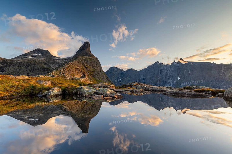 Romsdalshornet mountain reflected in mountain lake, Åndalsnes, Møre og Romsdal, Norway, Europe