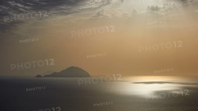 Santa Marina Salina, sunrise, sun rises behind Panarea, Salina, Aeolian Islands, Sicily, Italy, Europe