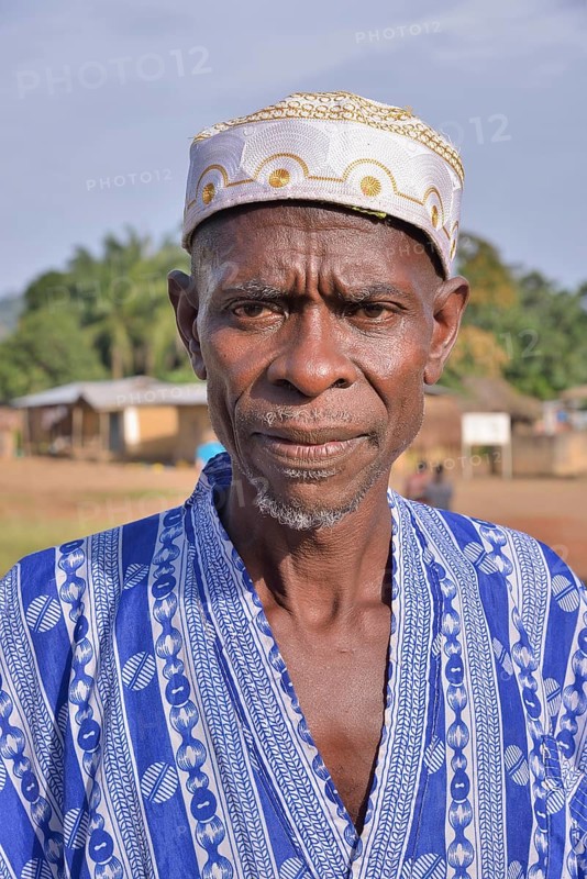 Portrait of a man in Muslim dress, Waiima, Kono District, Sierra Leone, Africa