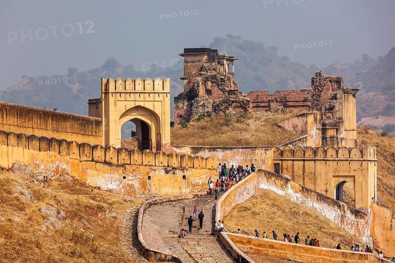 AMER, INDIA, NOVEMBER 18, 2012: Visitors ascending to Amer (Amber) fort. Amer (near Jaipur), Rajasthan, India, Asia