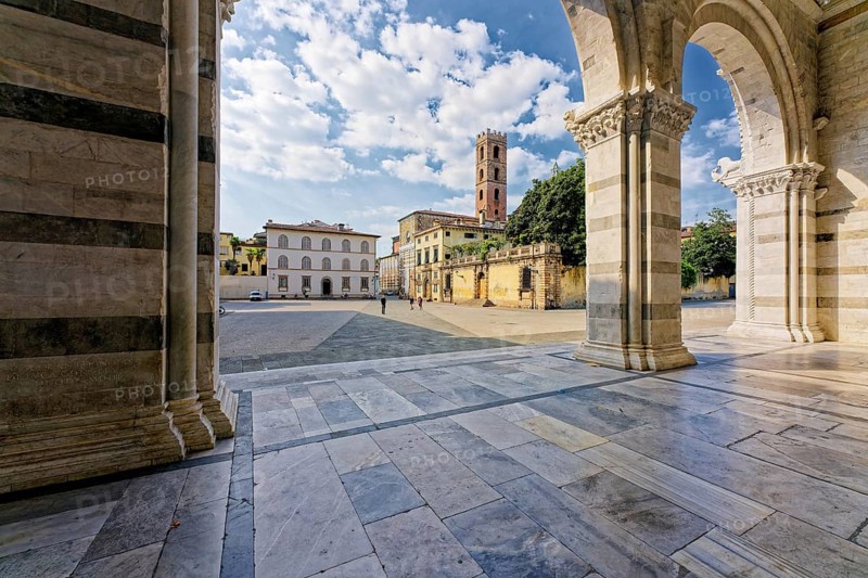 View from porch, portico or narthex, onto the Piazza San Martino and the Church of San Giovanni, Cathedral, Cattedrale di San Martino also Duomo di Lucca, Lucca, Tuscany, Italy, Europe