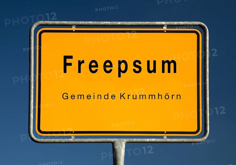 Place name sign for Freepsum, a village in the municipality of Krummhörn in the district of Aurich in East Frisia, Lower Saxony, Germany, Europe