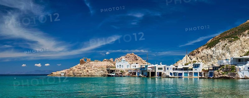 Panorama of the beach and fishing village of Firapotamos in Milos island, Greece, Europe