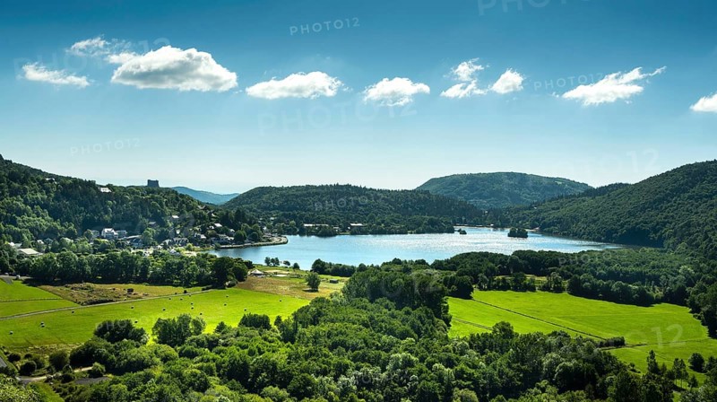 Lake Chambon and Murol castle, Regional Nature Park of the Volcanoes of Auvergne, Puy de Dome department, Auvergne Rhone Alpes, France, Europe
