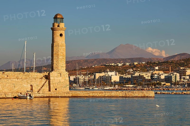 Venetian harbour, Venetian lighthouse, boat, water reflection, Ida massif, Psiloritis, spring clouds, Rethimnon, central Crete, island of Crete, Greece, Europe