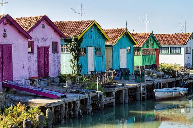 Colourfully painted wooden fishermen's huts, Le Château-d'Oléron, Oleron Island, Charente Maritime Department, Nouvelle-Aquitaine, France, Europe