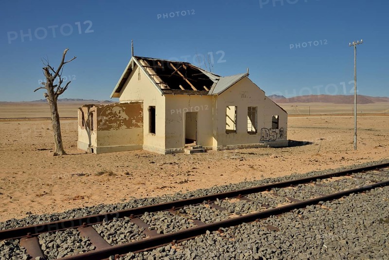 Derelict house next to train tracks, former railway station of Garub, Aus, Karas Region, Namibia, Africa