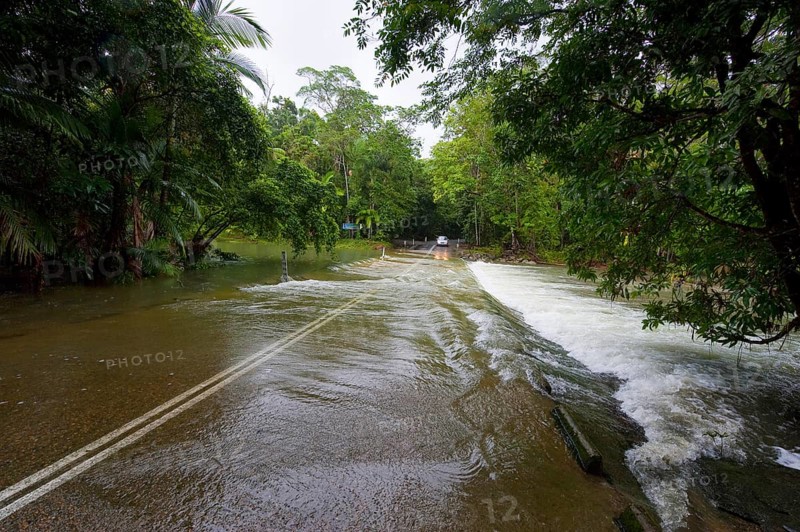 Flooded road, climate, river, rainforest, jungle, rain, flood, flooding in Daintree National Park, Queensland, Australia, Oceania