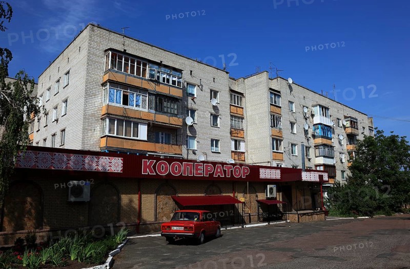 Small village with shops outside the uninhabitable 30-kilometre zone around the Chernobyl power plant and the workers' settlement of Pripyat, Ukraine, Europe