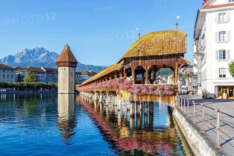Lucerne city on the river Reuss with Chapel Bridge and Mount Pilatus in Lucerne, Switzerland, Europe