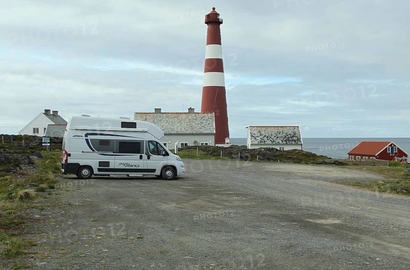 Motorhome in front of Gamvik lighthouse, the northernmost point in Norway accessible by car on the Barents Sea, Norway, Scandinavia, Europe