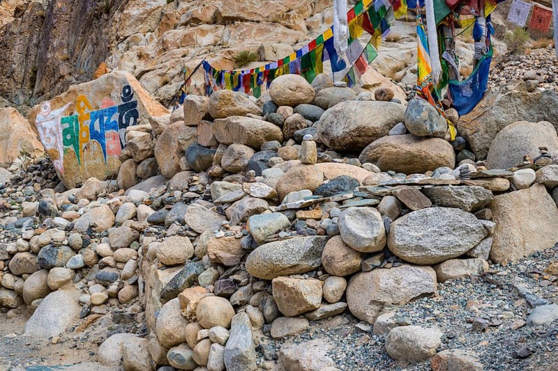 Mani stones with the engraved Tibetan mantra Om Mani Padme Hum, Nubra Valley, Ladakh, Jammu and Kashmir, India, Asia