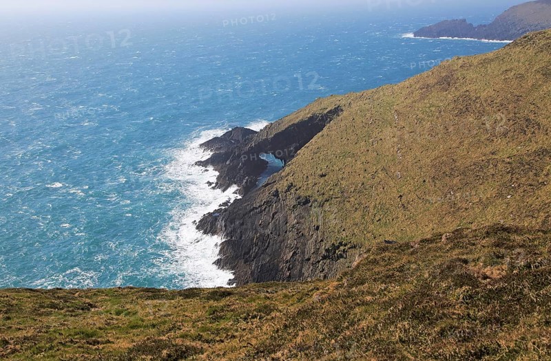Natural arch in cliffs, Cape Clear Island, County Cork, Ireland, Irish Republic, Europe