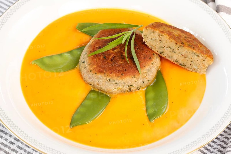 Vegetarian cuisine, walnut cakes on sugar snap peas with pumpkin sauce, sauce, vegetables, snow peas, walnut, savoury, vegan, salty, fried, healthy, main course, soup plate, new cuisine, modern cuisine, beautifully arranged, food photography, studio, Germany, Europe