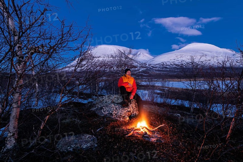 Man at the campfire, Stora Sjöfallet National Park, World Heritage Laponia, Norrbotten, Lapland, Sweden, Lapland, Sweden, Europe