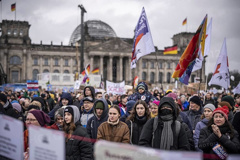150, 000 people gather around the Bundestag in Berlin to build a human wall against the shift to the right in society. We are the firewall chanted demonstrators from a wide range of social groups. Recordings on 03.02.2024 in Berlin