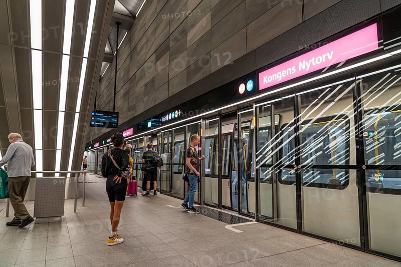 The metro, underground, light rail, in Copenhagen, 4 lines have been crossing the city since 2002, modern, driverless, automatic trains run every 2 minutes, platform screen doors, Denmark, Europe