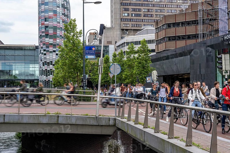 Central cycle path on the Vredenburgviaduct, at the Hoog Catharijne shopping centre, behind Utrecht Centraal station, in the city centre of Utrecht, heavy traffic, Netherlands
